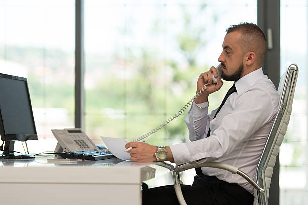 istock Businessman Talking On Telephone In Office 479971722