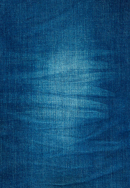 istock background texture of blue jeans with pleats and scuffed 479972208