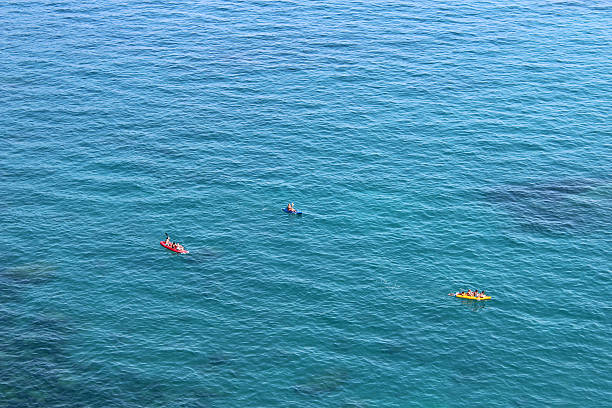 istock Three canoes in a sea 479972366