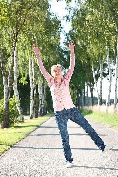 istock Happy senior woman active in nature 479972614
