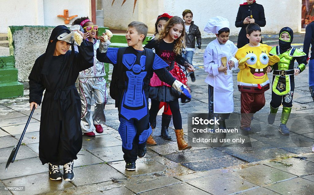 Kids dressed up for Purim / Halloween Kfar Saba, Israel - March 14, 2014:  Unidentified children aged 7-8 dress up for Purim.  Purim is celebrated in Israel secular communities by dressing up in special custumes, music, and festivals. Halloween Stock Photo