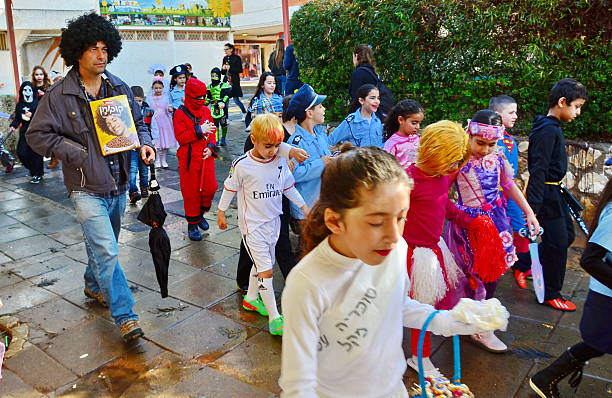 Kfar Saba, Israel - March 14, 2014:  Unidentified children aged 7-8 dress up for Purim.  Purim is celebrated in Israel secular communities by dressing up in special custumes, music, and festivals.