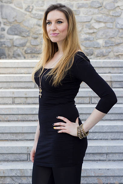 istock WOMAN IN BLACK, THE STAIRS 479972758