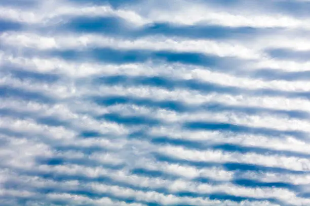 Rippled Cloud Patterns in Blue Sky