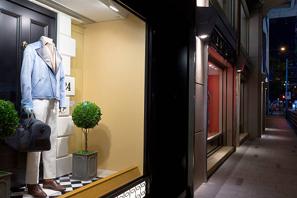 istock mannequin in fashion shop display window 479976536