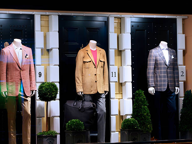 Fashion shop display window with mannequins