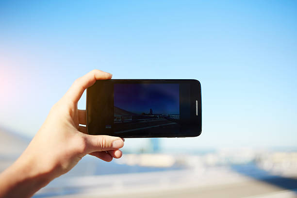 istock Tourist taking a photo using smart phone camera 479979682