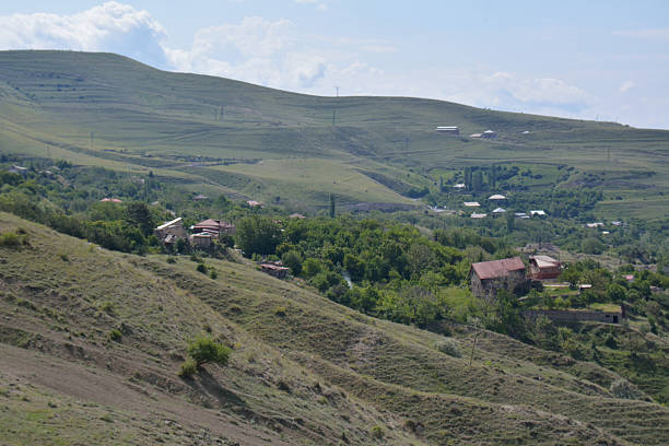 istock Mountains and a village 479993330