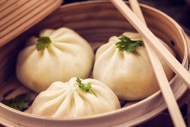 istock Dim Sum Dumplings Freshly Steamed in a Bamboo Steamer 479997032