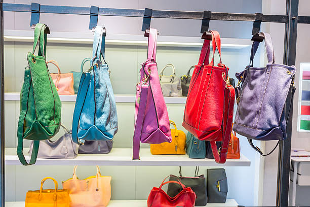 istock female bags in shop display window 479997362