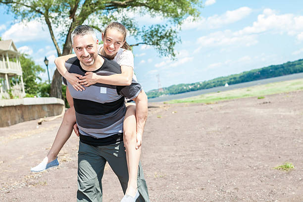 istock Father and daughter have fun outside 479998164