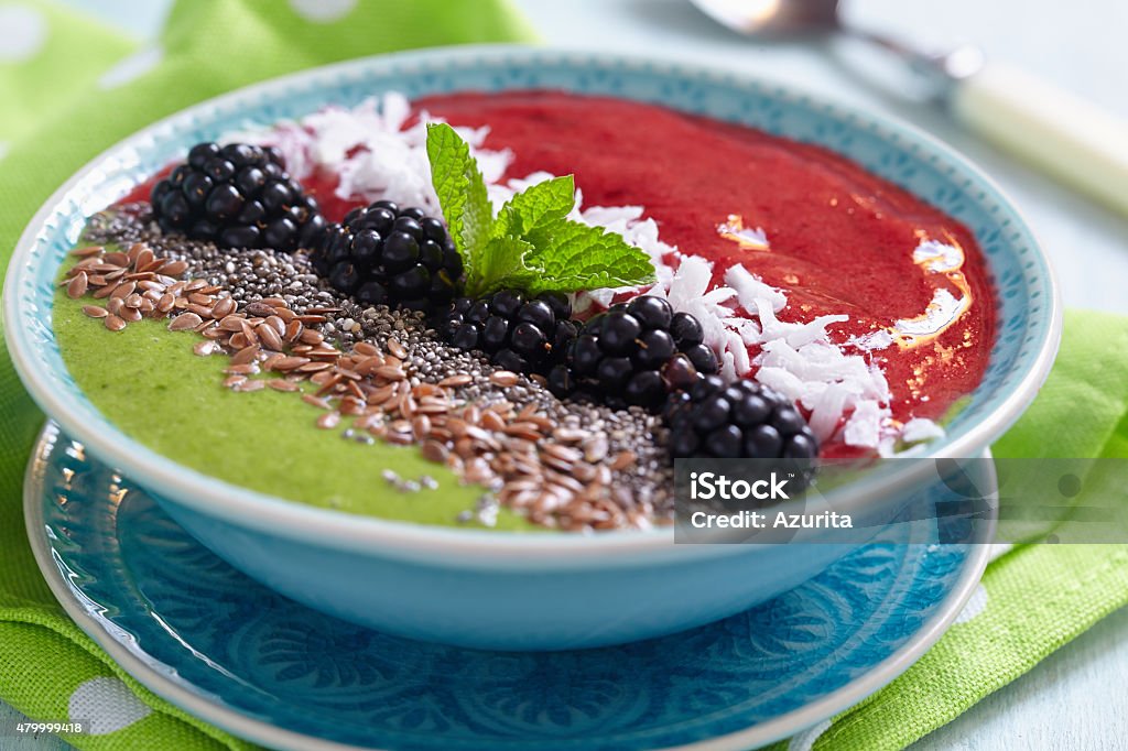 Smoothie bowl Breakfast bowl with green and blackberry smoothie 2015 Stock Photo