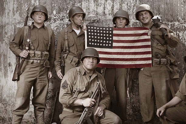 istock WW2 platoon holding American Flag 480003058