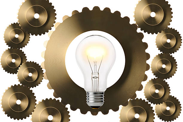 istock Isolated shot of light bulb with gears on white background 480003150