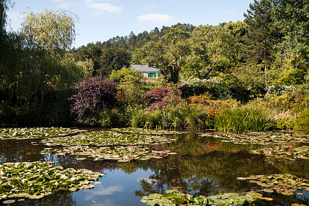 House of Claude Monet in Giverny House and garden of Claude Monet in Giverny on a sunny day claude monet photos stock pictures, royalty-free photos & images