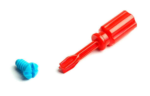 istock Toy plastic screwdriver and screw 480005802