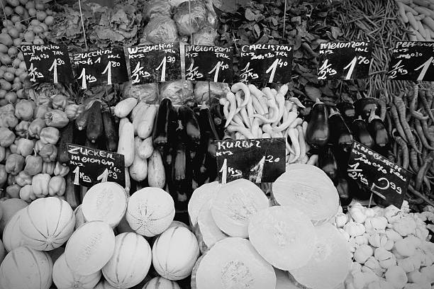 Fresh produce stand at a marketplace in Vienna, Austria. Farmers market. Black and white retro style.