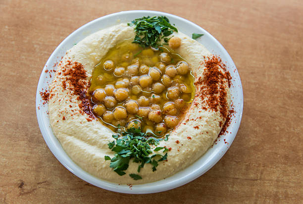 Naan Bread On A Wooden Board Plate. Hummus With Pita Bread, Olive, Arab Chickpeas Or Kacang Arab, Lemon Juice, Garlic And Salt. Middle Eastern Food Menu. Top View.