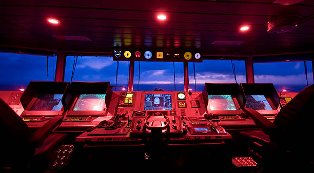 Wheelhouse in modern ship - Bridge This is the center of command of a ship naval ship stock pictures, royalty-free photos & images