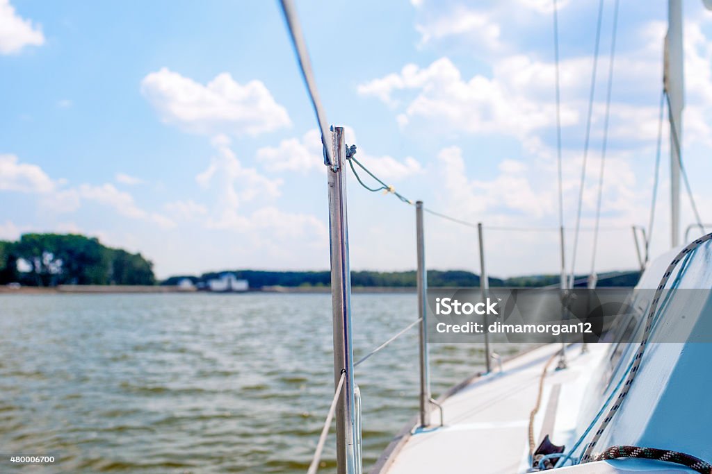 Port Side of Mid-Size Yacht Ready to Set Sail Port Side of Mid-Size Yacht Ready to Set Sail. Horizontal Image Composition 2015 Stock Photo