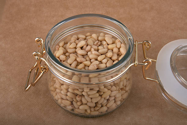 istock Glass jar of cedar nuts 480009948