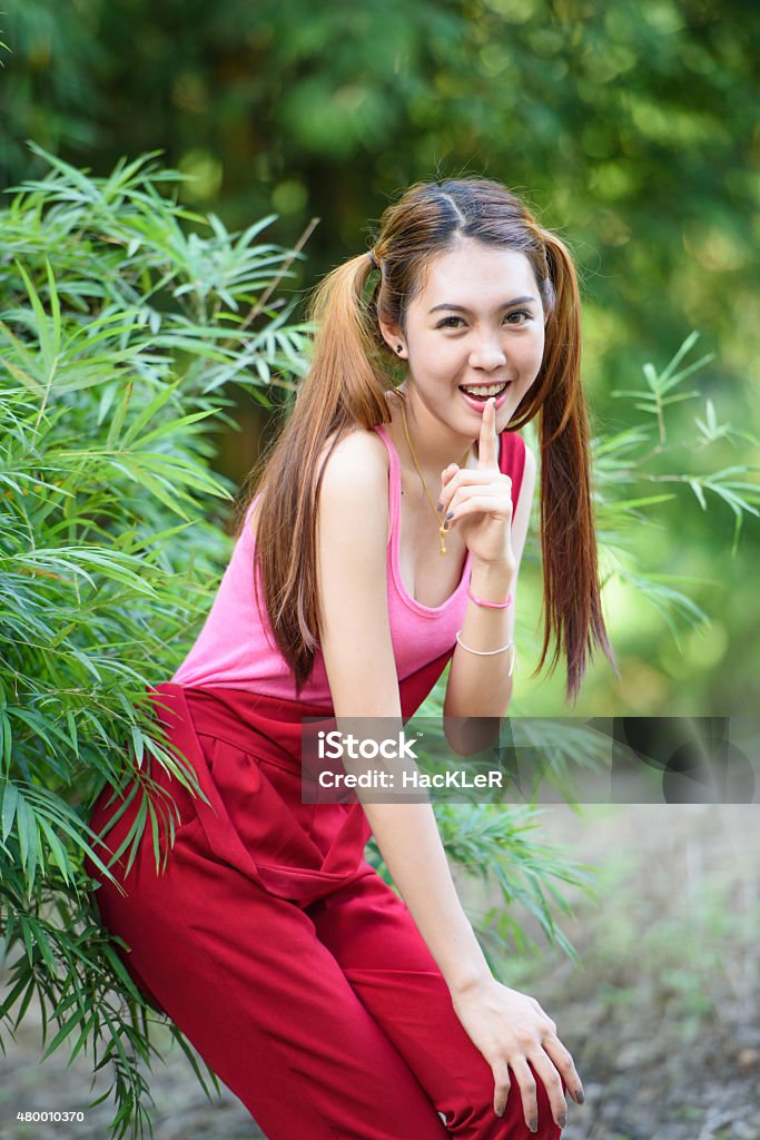 Portrait Of A Lovely Girl With 2 Pony Tails Hairstyle Stock Photo -  Download Image Now - iStock