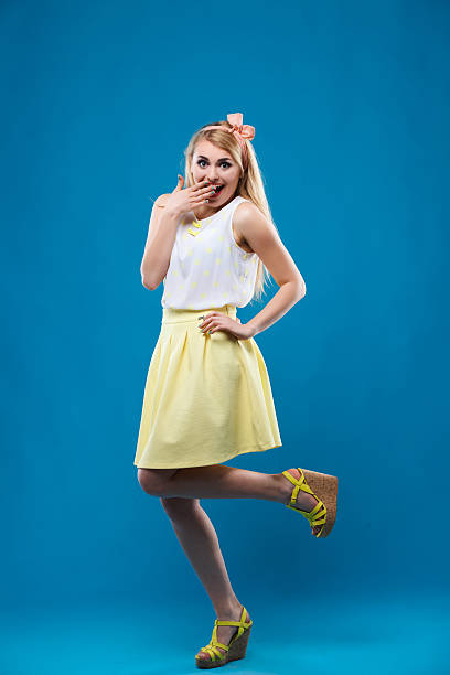 istock girl in the studio, pin-up, flirting, showing different emotions 480011894