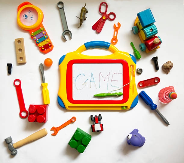 детские, забавные фон с игрушками и магнитная доска - screwdriver isolated blue work tool стоковые фото и изображения