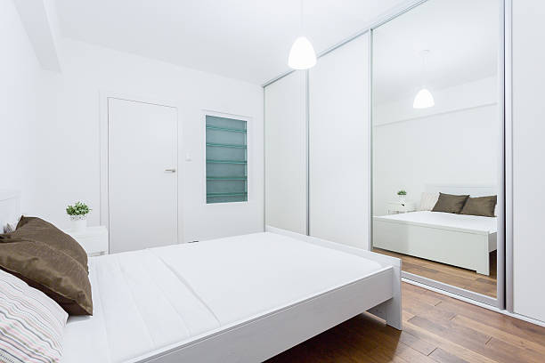 istock White bedroom in contemporary apartment 480013276