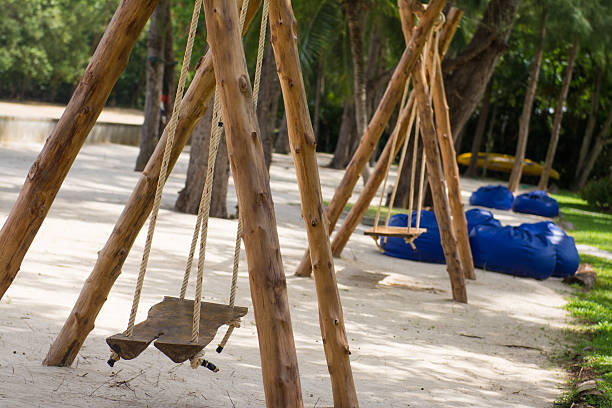 istock wooden swing for relaxation in garden 480014482