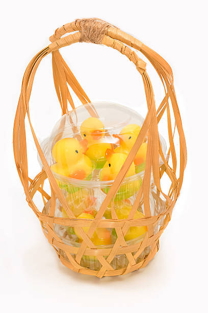 istock yellow duck jelly  in a delivery basket 480017990