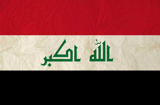 Flag of Iraq with vintage old paper texture