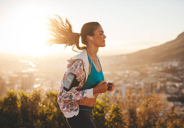 istock Beautiful young woman out for a run 480018602