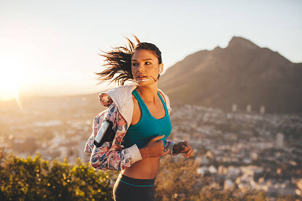 istock Female runner running outdoor in nature 480018614