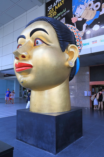 Bangkok Thailand - April 19, 2015: Big Buddha face statue in front of CentralWorld shopping mall in Siam Bangkok Thailand.