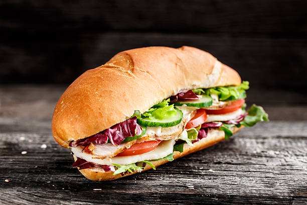 istock Sandwich with chicken, cheese and vegetables 480030932