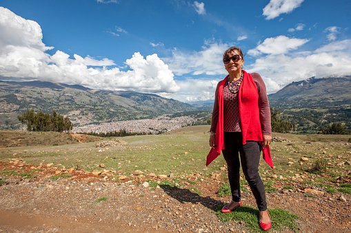 Mature hispanic woman in the Andes countryside above Huaraz