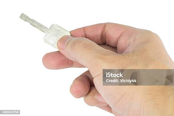 Hand Man Un Lock The Key Stock Photo - Download Image Now - 2015, Chrome, Close-up