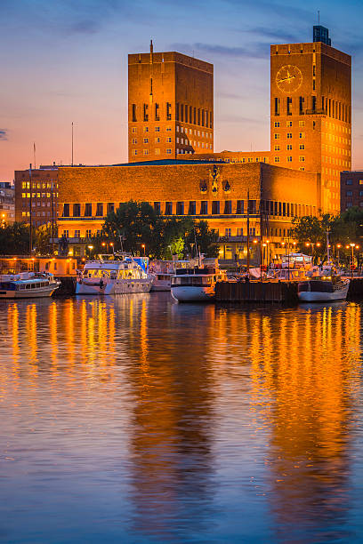 istock Oslo iconic towers City Hall overlooking tranquil sunset harbour Norway 480041004