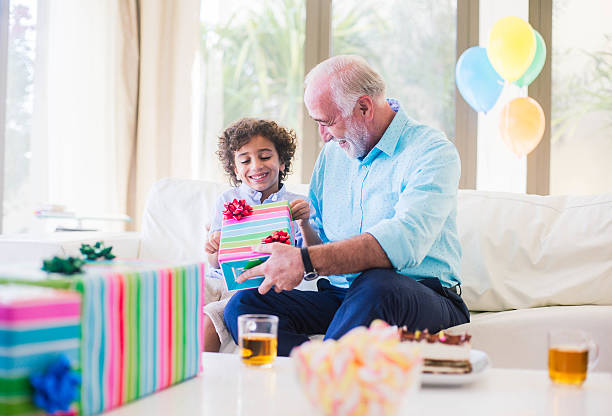 istock Three generation family celebrating a birthday in Dubai. 480043328