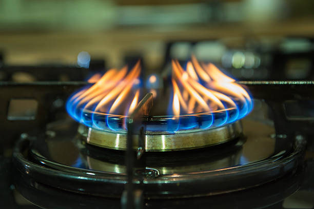istock Blue flames on kitchen gas cooker. 480044060