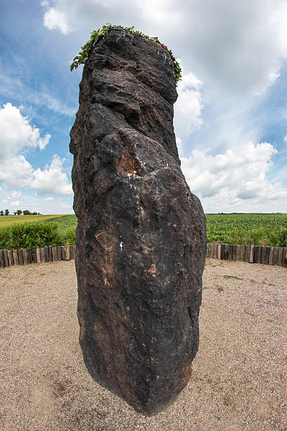 Menhir Stone Shepherd Menhir Stone Shepherd (also Stone Man, Petrified Man or Petrified minister) is a menhir standing alone in a field 1 km northwest of the village Klobuky, district Kladno. This is the highest menhir in the Czech Republic.  3.5 m tall columnar rock uncut dark iron Cretaceous sandstone. This is one of the few stones in the country, which we can with high probability be considered a real prehistoric menhir. oracular stock pictures, royalty-free photos & images