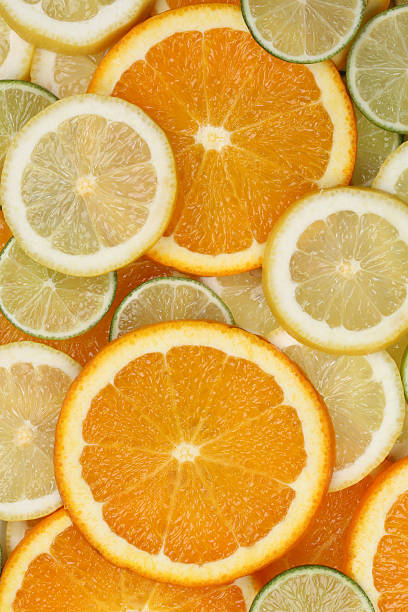 istock Collection of sliced orange, lemon and limes background 480044758