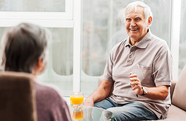 istock Cheerful senior communicating with his wife at home. 480048468