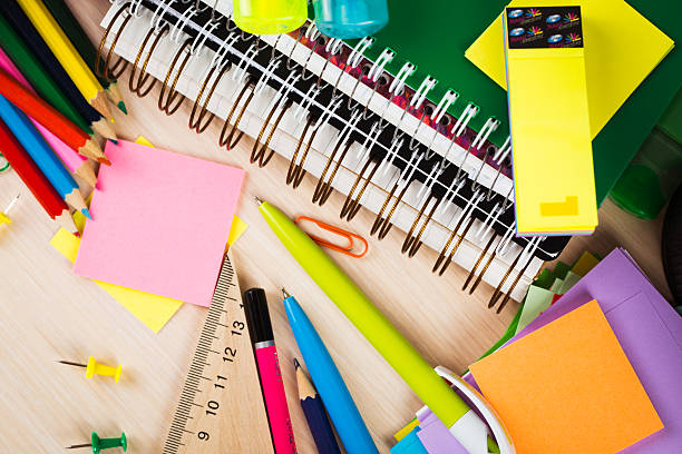 istock School and office accessories on wooden background 480048896