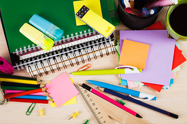 istock School and office accessories on wooden background 480048906