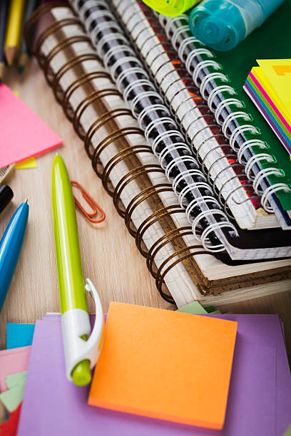 istock School and office accessories on wooden background 480048912