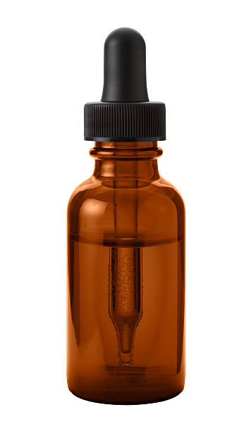 Brown Eye Dropper Bottle  with a clipping path Brown Eye Dropper Bottle Isolated with clipping path on a white background tincture photos stock pictures, royalty-free photos & images