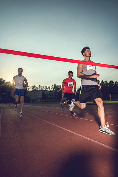 istock Young runners having a sports race on a stadium. 480051638