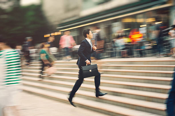 istock Businessman running on the street 480052280